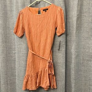 Pink size XXS macys dress super cute it’s a soft pink cocktail style dress